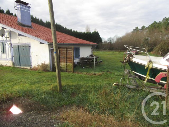 Afficher la photo en grand maison à vendre - 4 pièces - 190.0 m2 - YGOS ST SATURNIN - 40 - AQUITAINE - Century 21 Glockner